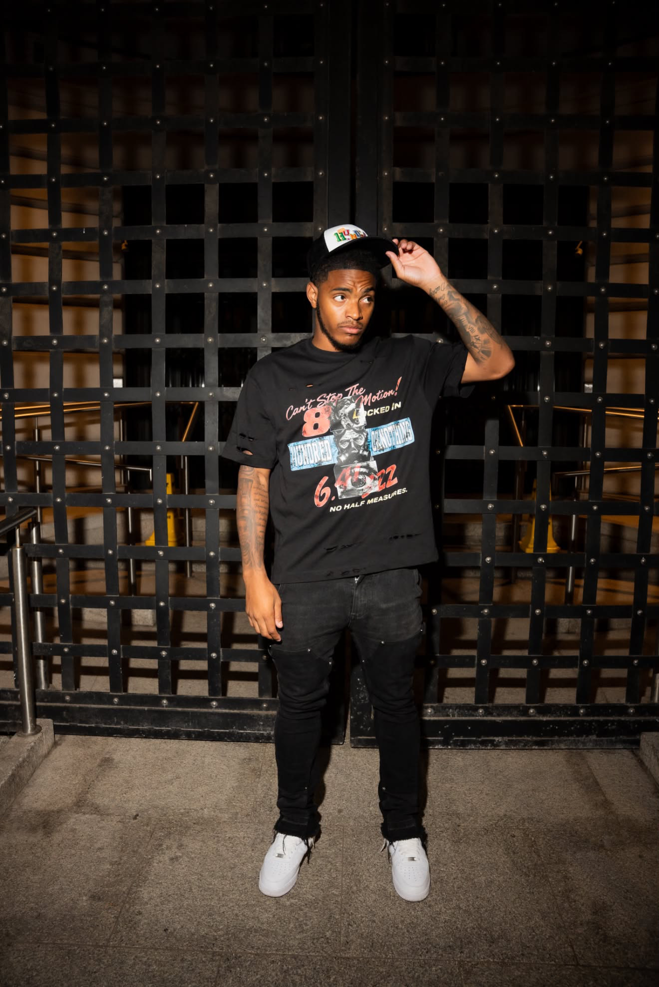 Model wearing the black Motion Tee